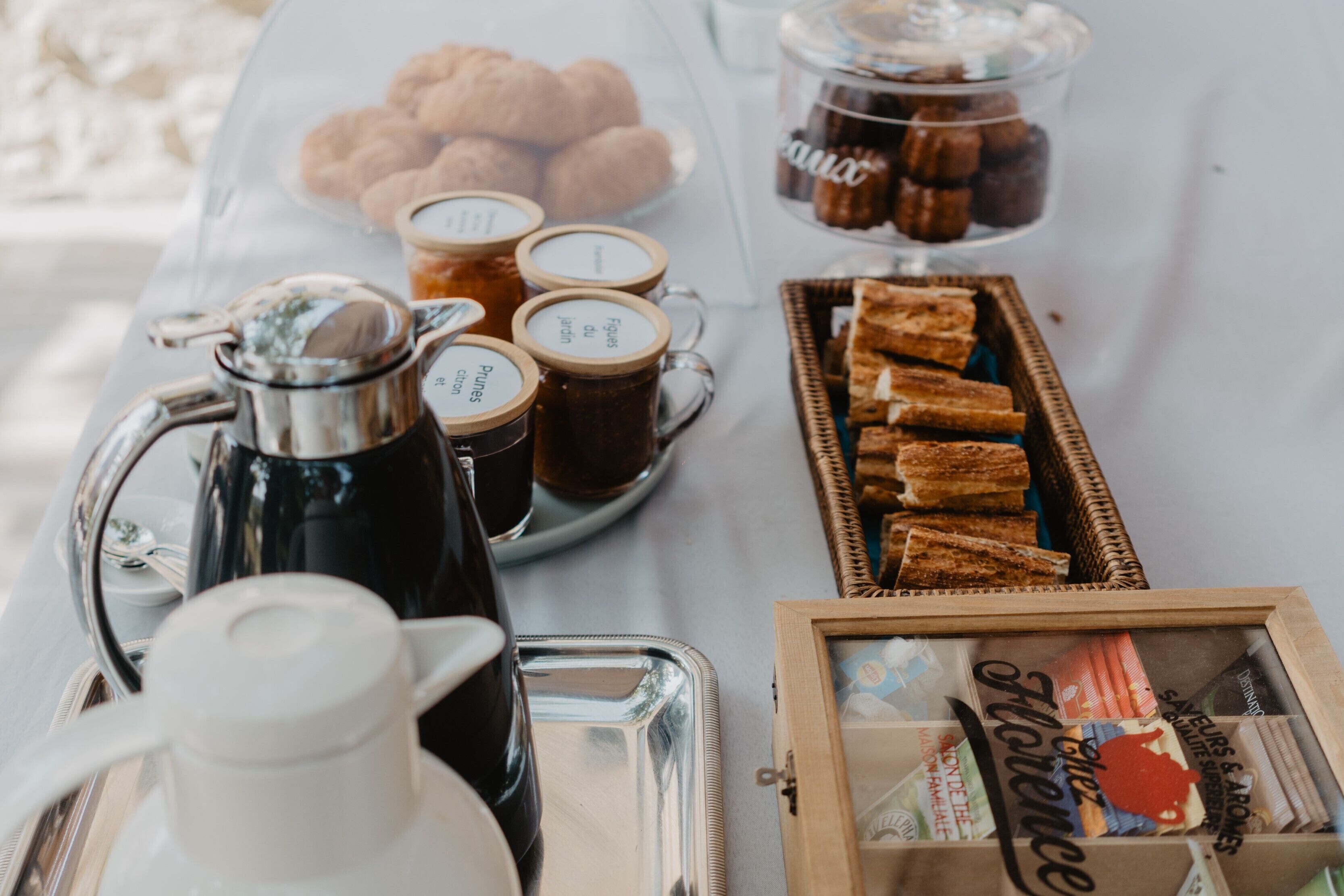 A breakfast buffet with various food items and beverages.