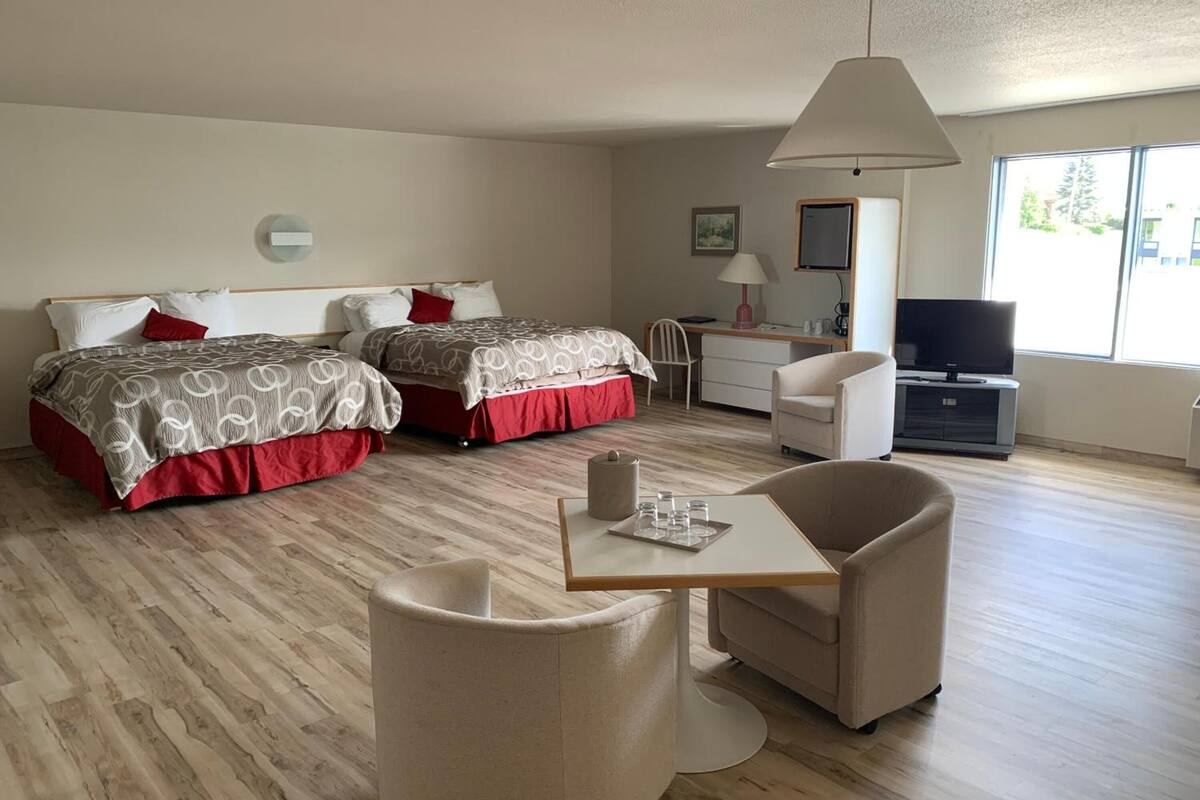 pillow-top beds, desk, blackout curtains, soundproofing