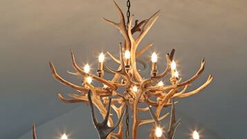 A chandelier with multiple branches and lights.