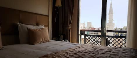 Egyptian cotton sheets, premium bedding, minibar, in-room safe