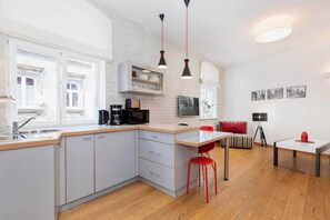 Fridge, microwave, stovetop, coffee/tea maker