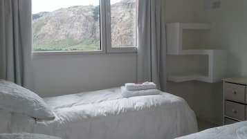 Apartment, 1 Queen Bed, Mountain View | Down duvets, individually furnished, blackout curtains, free WiFi