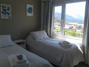 Appartement, 1 lit double | Couette en duvet, ameublement unique, rideaux d’obscurcissement