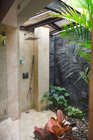Bathtub, hair dryer, towels, soap
