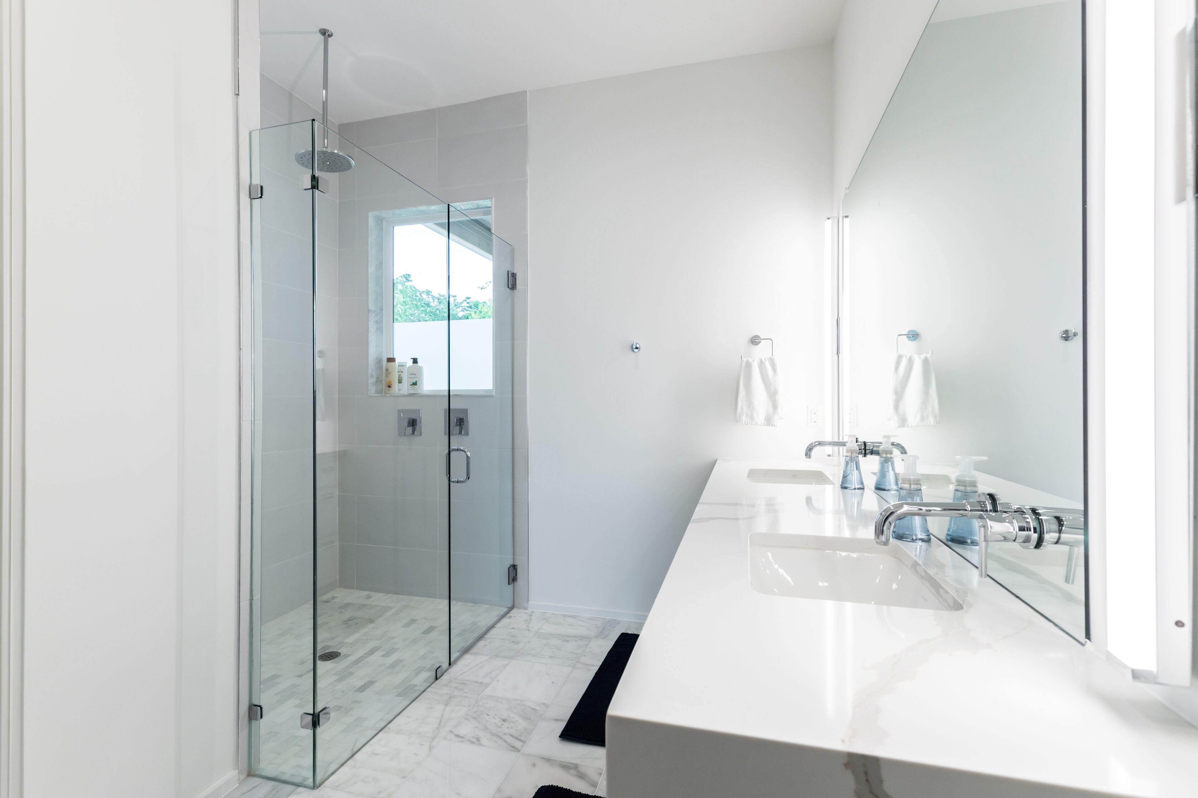 Combined shower/tub, hair dryer, towels, soap