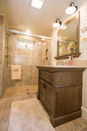 Bathtub, hair dryer, towels, soap