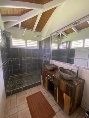 Bathtub, hair dryer, towels, soap