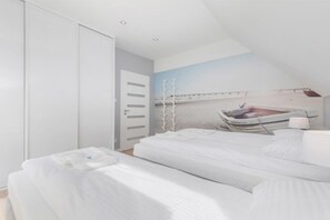 2 slaapkamers, een strijkplank/strijkijzer, reisbedje, wifi