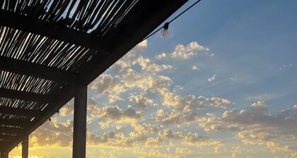 Studio standing jardin privé,climatisé,le confort au soleil à deux pas de la mer