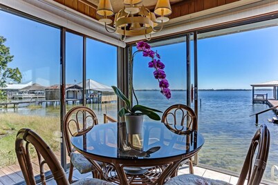 Spectacular Views On A Pristine Lake, Home sits at the waters edge for best view