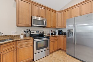 Fridge, microwave, stovetop, dishwasher - Sea la Vie offers Bay Views, Pool, and is Pet Friendly (Fort Myers Beach)