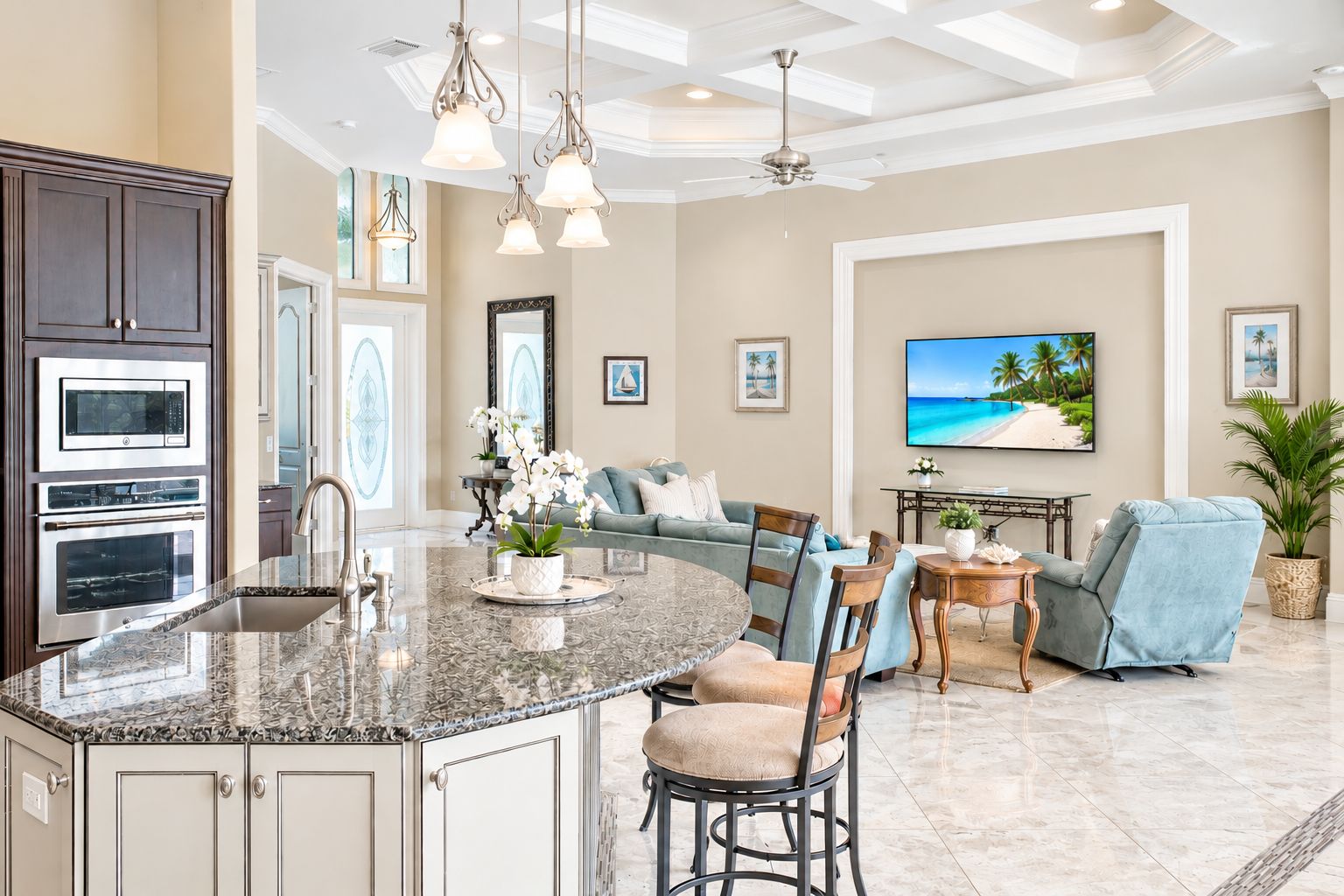 A spacious living area with a kitchen, a dining table, and a comfortable seating arrangement.