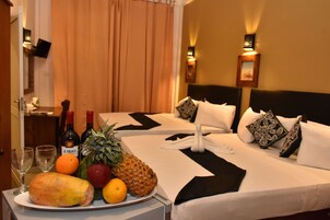 Ropa de cama de alta calidad y minibar 