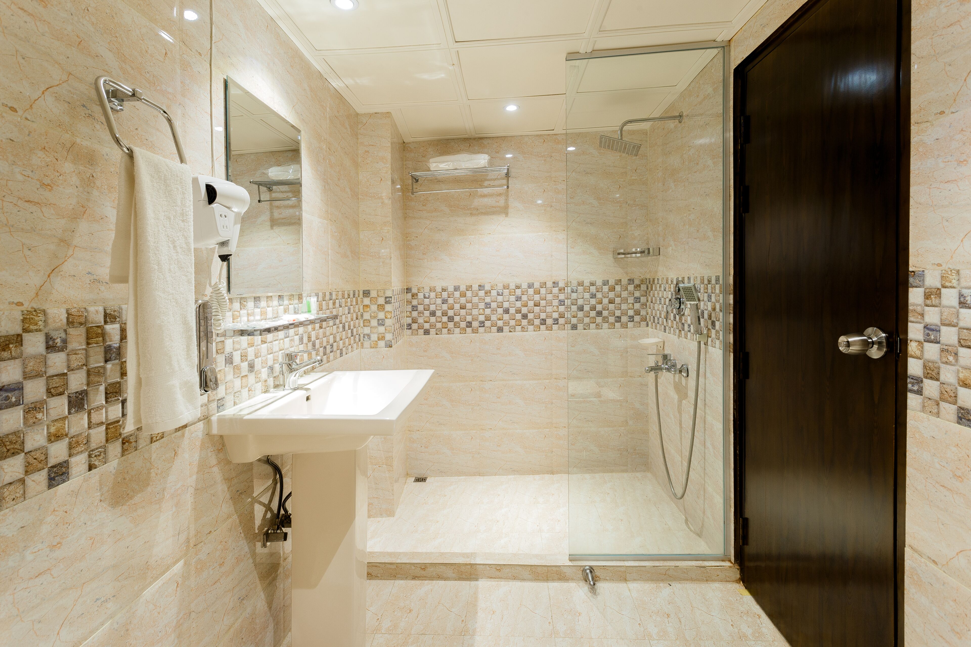 shower, rainfall showerhead, eco-friendly toiletries, slippers