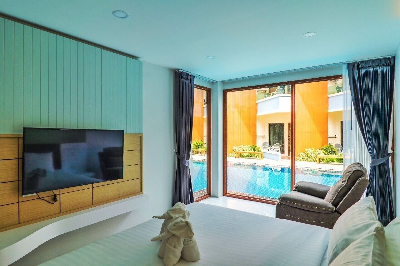 2Bed Room Family Pool Access | Premium bedding, in-room safe, desk, laptop workspace