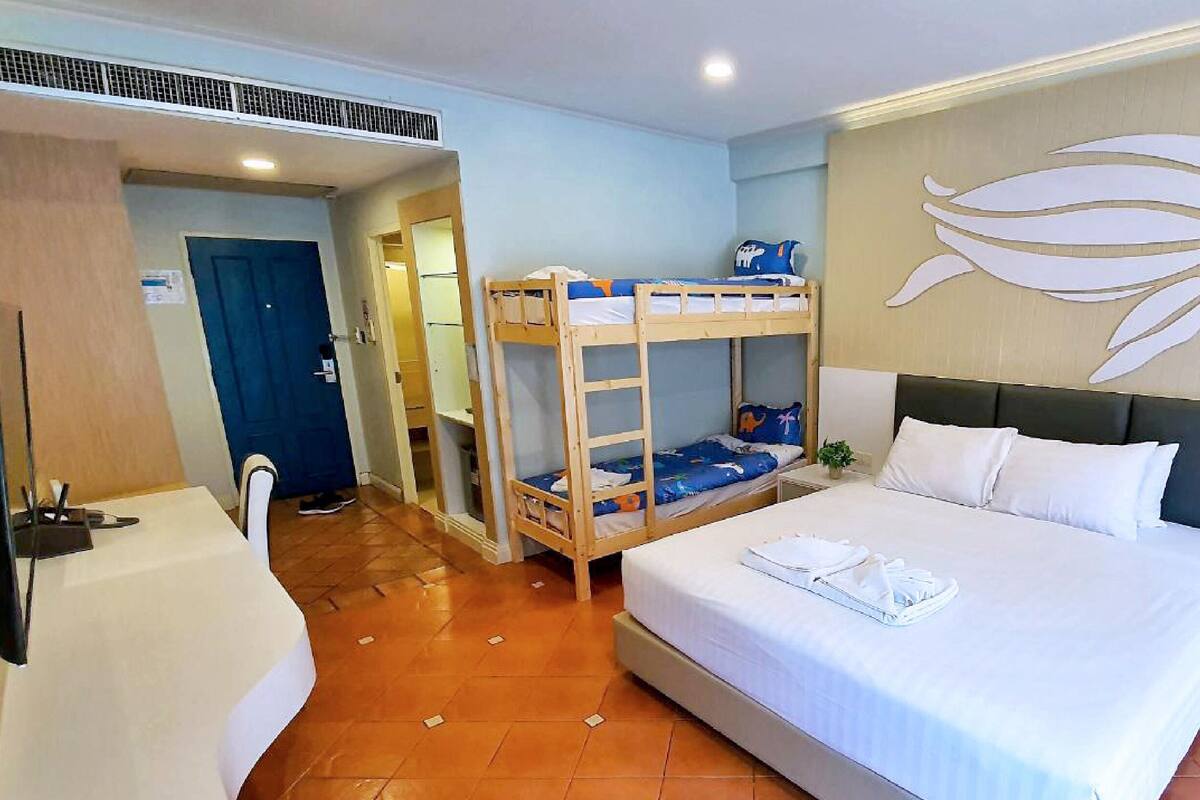 Superior Bunk Bed Pool Access | Premium bedding, in-room safe, desk, laptop workspace