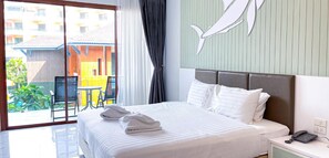 Deluxe King Room | Ropa de cama de alta calidad, caja fuerte, escritorio