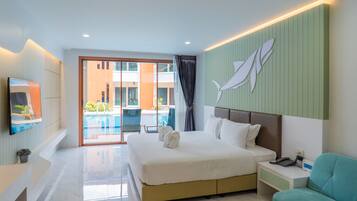Deluxe Pool Access | Premium bedding, in-room safe, desk, laptop workspace