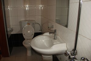 Standard Double Room | Bathroom | Shower, slippers, bidet, towels