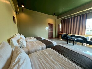 Superior Triple Room | Minibar, desk, blackout drapes, soundproofing