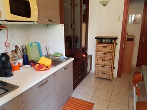 Fridge, microwave, stovetop, dishwasher - Portion of a villa near the sea (La Maddalena)