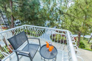 Quarto casal premium, 1 quarto, vista para o jardim | Vista da sacada