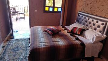 Individually decorated, blackout curtains, iron/ironing board