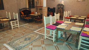 A room with multiple chess tables and chairs arranged for playing chess. - Dar Soulaimane Ourika (Ourika)
