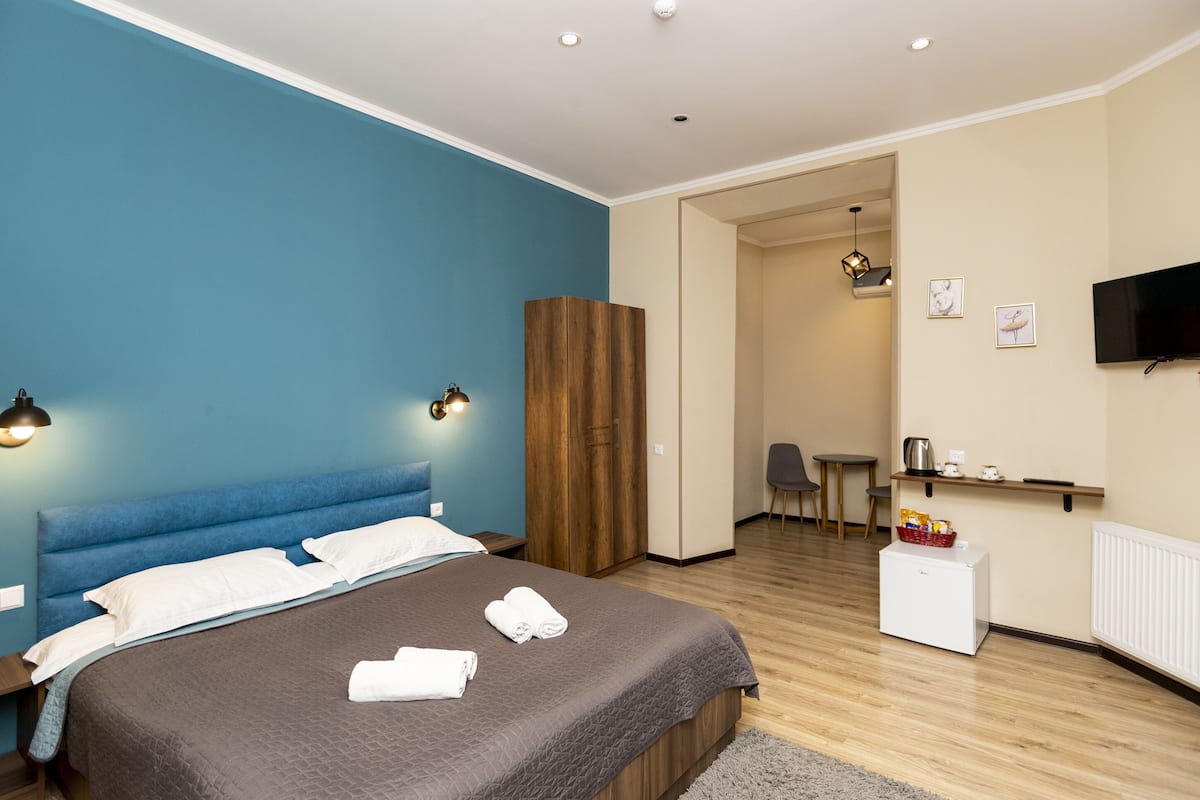 Habitación doble Royal, 1 cama King size, para no fumadores | 1 habitación, ropa de cama de alta calidad y minibar