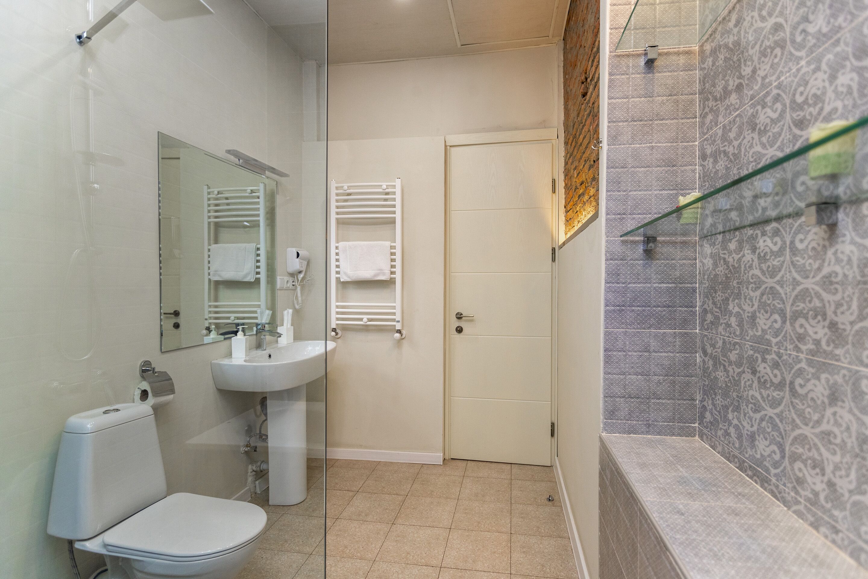 superior triple room, 1 king bed with sofa bed, non smoking | bathroom | free toiletries, hair dryer, dressing gowns, slippers