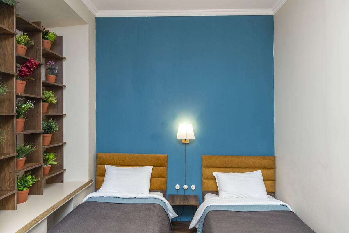 Deluxe Triple Room | 1 bedroom, premium bedding, minibar, iron/ironing board