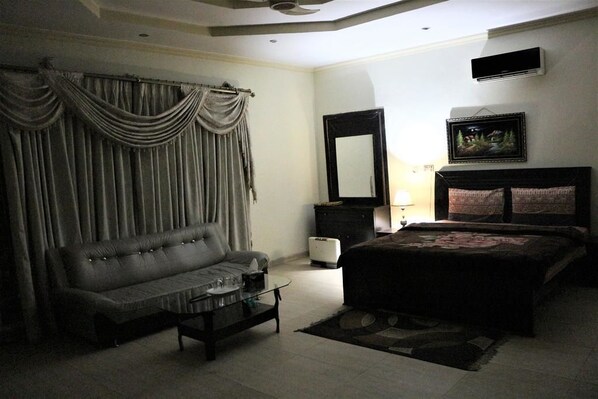 Family Room, Multiple Beds, Accessible, Smoking | In-room safe, iron/ironing board, free WiFi, bed sheets - Living Castle (Islamabad)