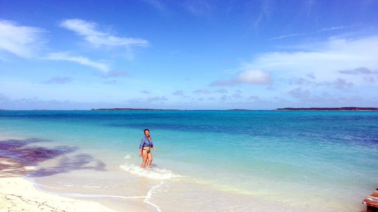 On the beach, sun loungers, beach towels