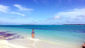 On the beach, sun loungers, beach towels