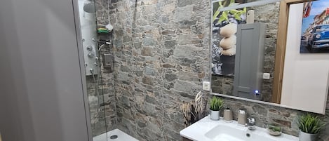Shower, hair dryer, towels, soap