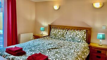 1 bedroom, desk, iron/ironing board, travel cot