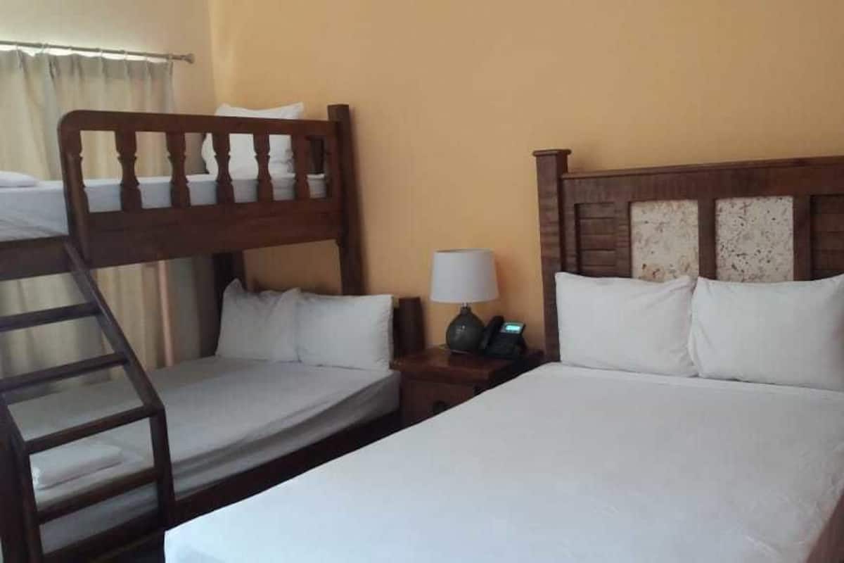 Superior Triple Room, Multiple Beds, Non Smoking, Resort View | 1 bedroom, hypo-allergenic bedding available, down comforters, desk