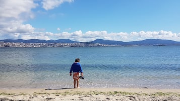 En la playa y toallas de playa