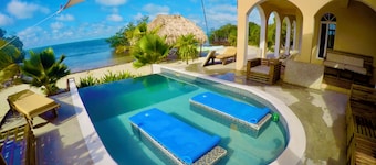 Karibisches Strandhaus mit 6 Schlafzimmern und großem Pool, Pier bringen Freunde / Familie