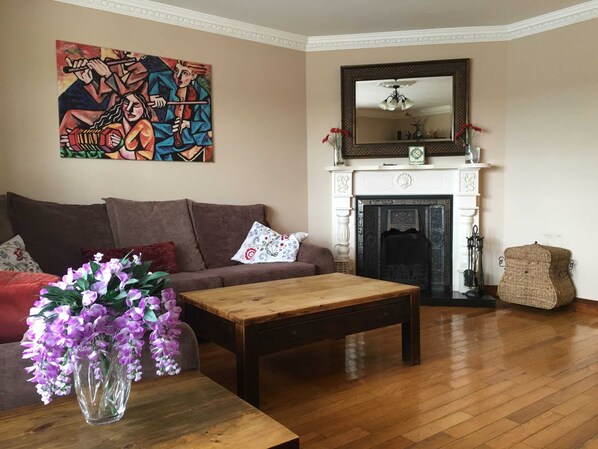 TV, fireplace, books, offices