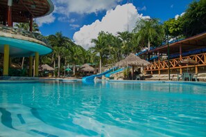 2 outdoor pools, open 9:00 AM to 7:00 PM, pool umbrellas