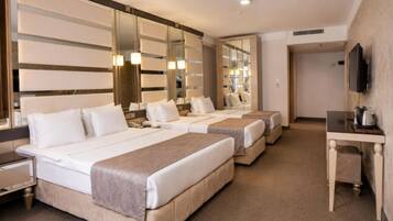 Chambre Quadruple Familiale | Literie de qualité supérieure, minibar, coffres-forts dans les chambres