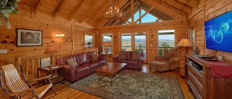 TV connectée, cheminée, lecteur de DVD, baby-foot