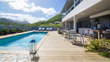 Outdoor pool, open 8:00 AM to 9:00 PM, pool umbrellas, pool loungers