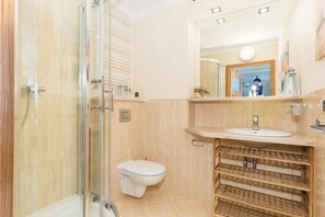 Shower, hair dryer, towels