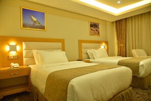 In-room safe, desk, blackout curtains, iron/ironing board - Muscat Plaza Hotel (Muscat)