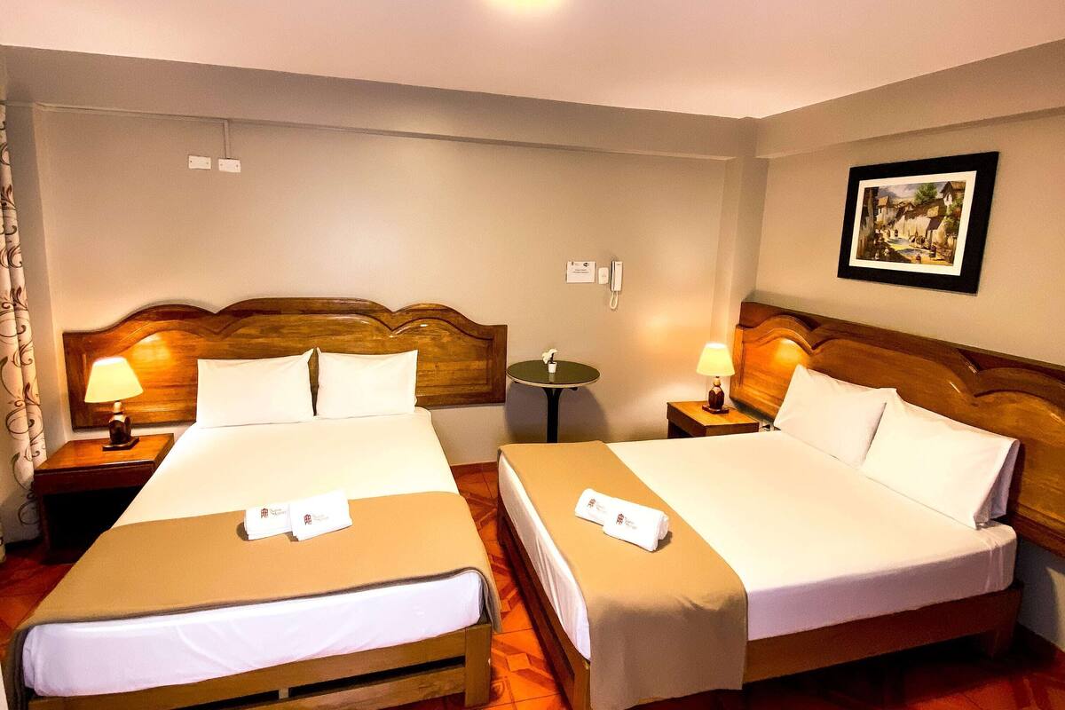 Premium bedding, desk, laptop workspace, blackout curtains