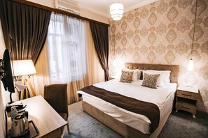 Suite Deluxe | Minibar, coffres-forts dans les chambres, décoration personnalisée