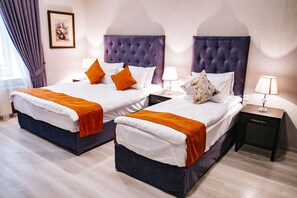Deluxe Triple Room | Minibar, in-room safe, individually decorated, individually furnished - La Casa Hotel Baku (Baku)