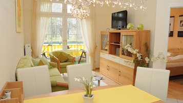 Comfort-Apartment | Wohnbereich | Flachbildfernseher